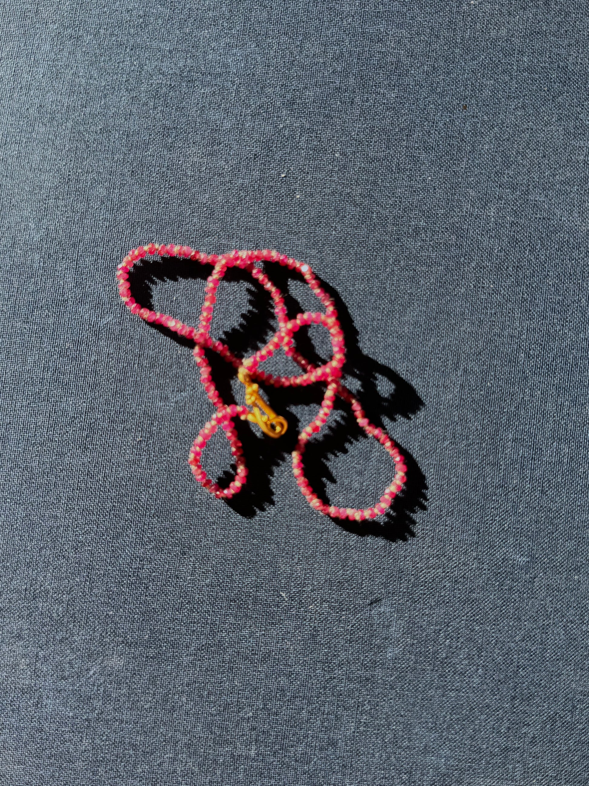 22k Tiny Faceted Ruby Strand