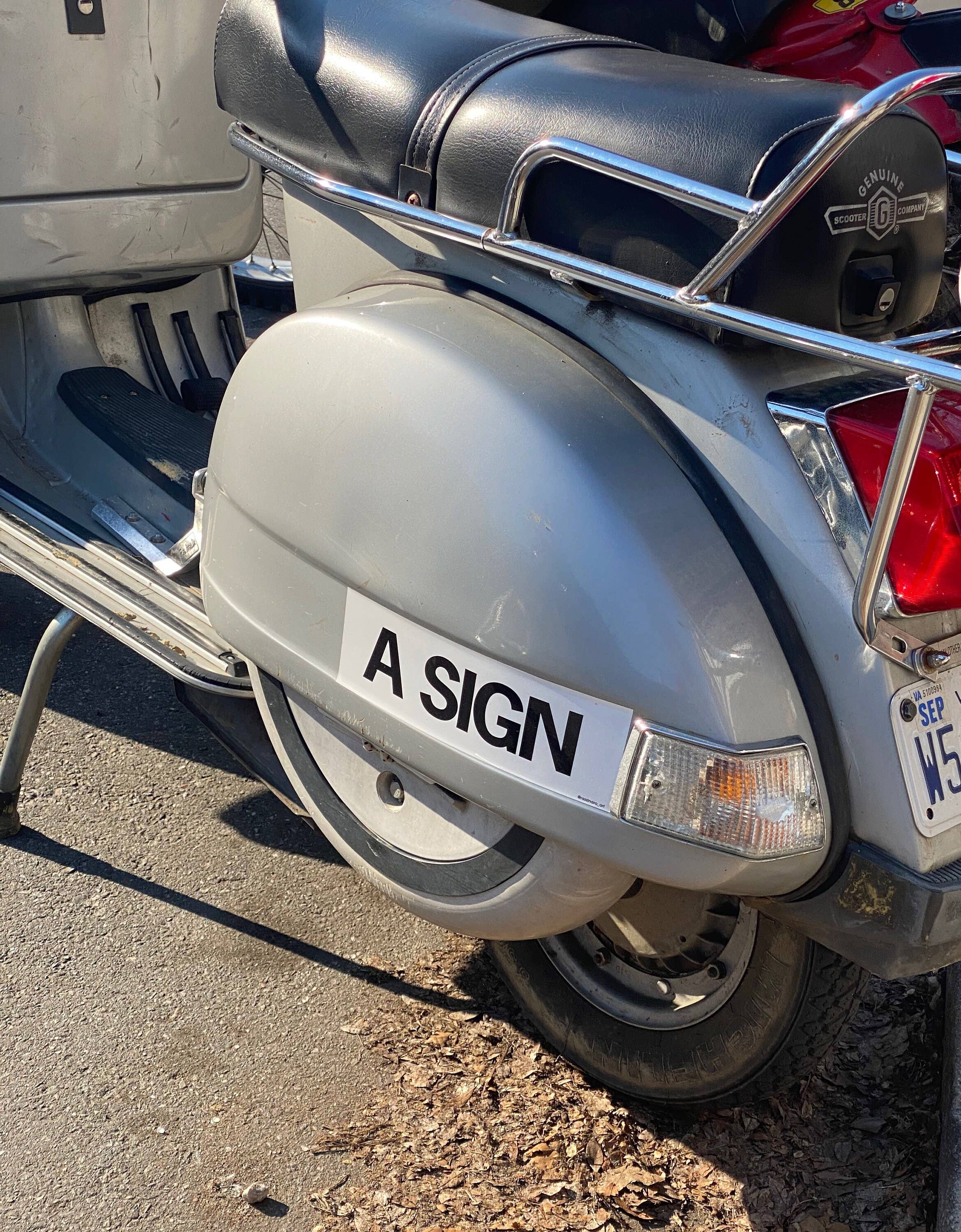 A Sign – Bumper Sticker