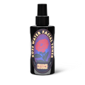Black bottle of Church Rose Water Facial Toner on a white background