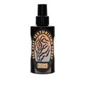 A black spray bottle of Church California Sea Salt Texturizing Spray with a black nozzle, featuring a circular label with a tiger-stripe design and gold lettering on a white background.