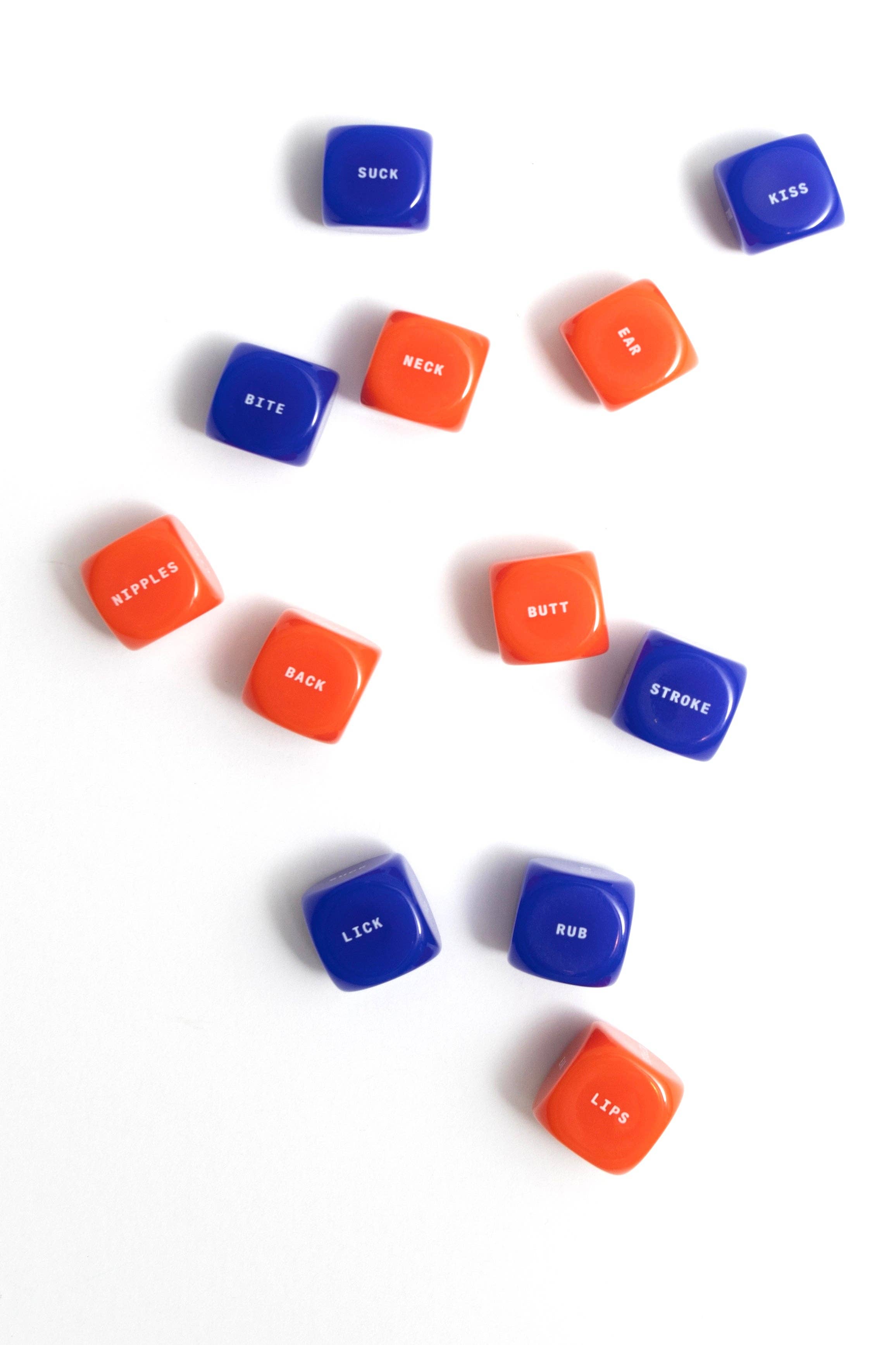 Blue and orange dice with text on a white background