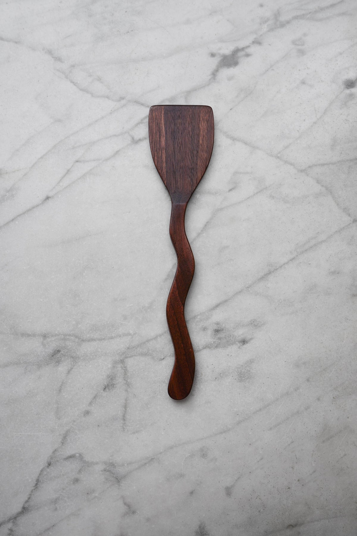 Wooden spatula on a marble surface