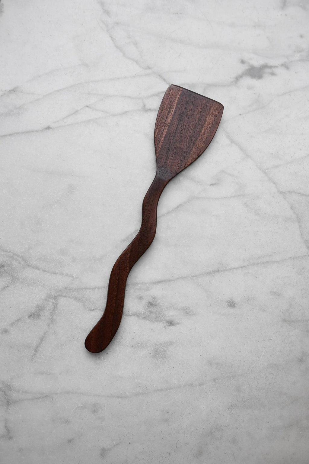 Wooden spatula on a marble surface