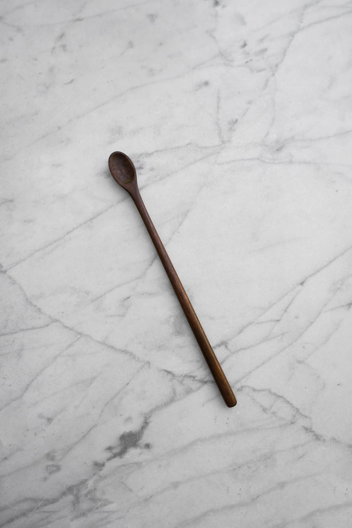 Wooden spoon on a marble surface