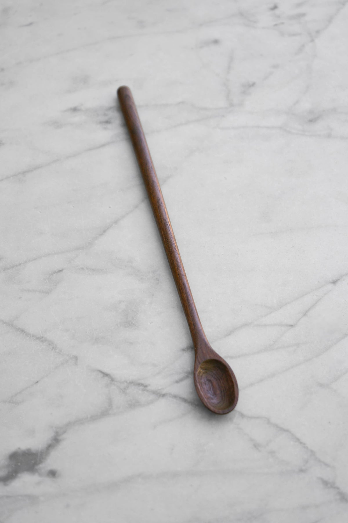 Wooden spoon on a marble surface