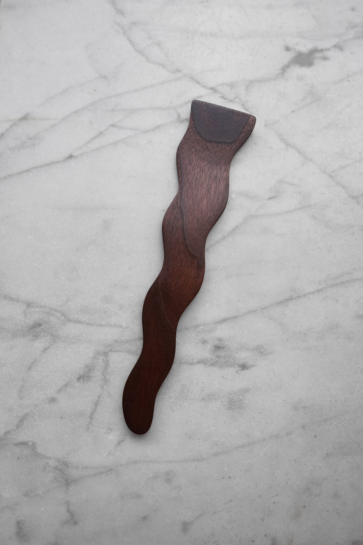 Wooden spatula on a marble surface