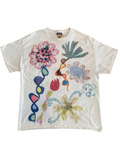 An off-white short-sleeve t-shirt featuring a colorful, hand-drawn style graphic print of various flowers and abstract organic shapes.