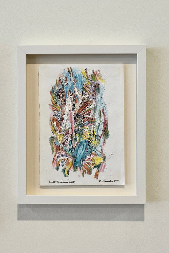 Framed abstract artwork with colorful brush strokes on a neutral background