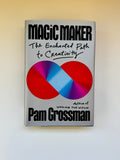 The book 'The Enchanted Path to Creativity' by Pam Grossman, featuring a silver-gray cover with a large red and purple infinity symbol containing a light blue center, photographed on a light beige background.