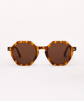 Round sunglasses with tortoiseshell frame and brown lenses on a white background