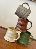 Zoe Dering Carved Mugs